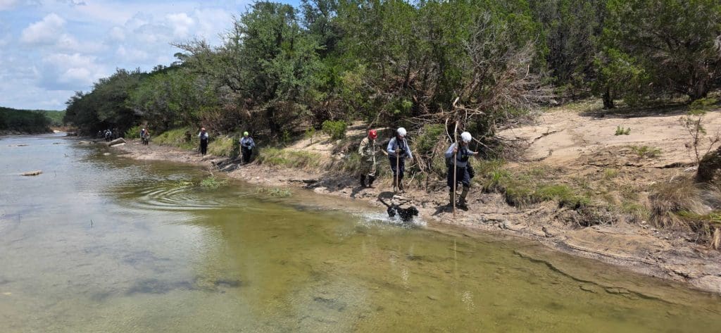 Wisconsin Task Force 1 members and canine search area along the river in Texas. Courtesy: Wisconsin Task Force 1