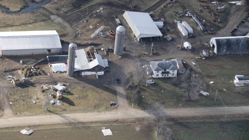 An aerial photo of a farm after a tornado disaster