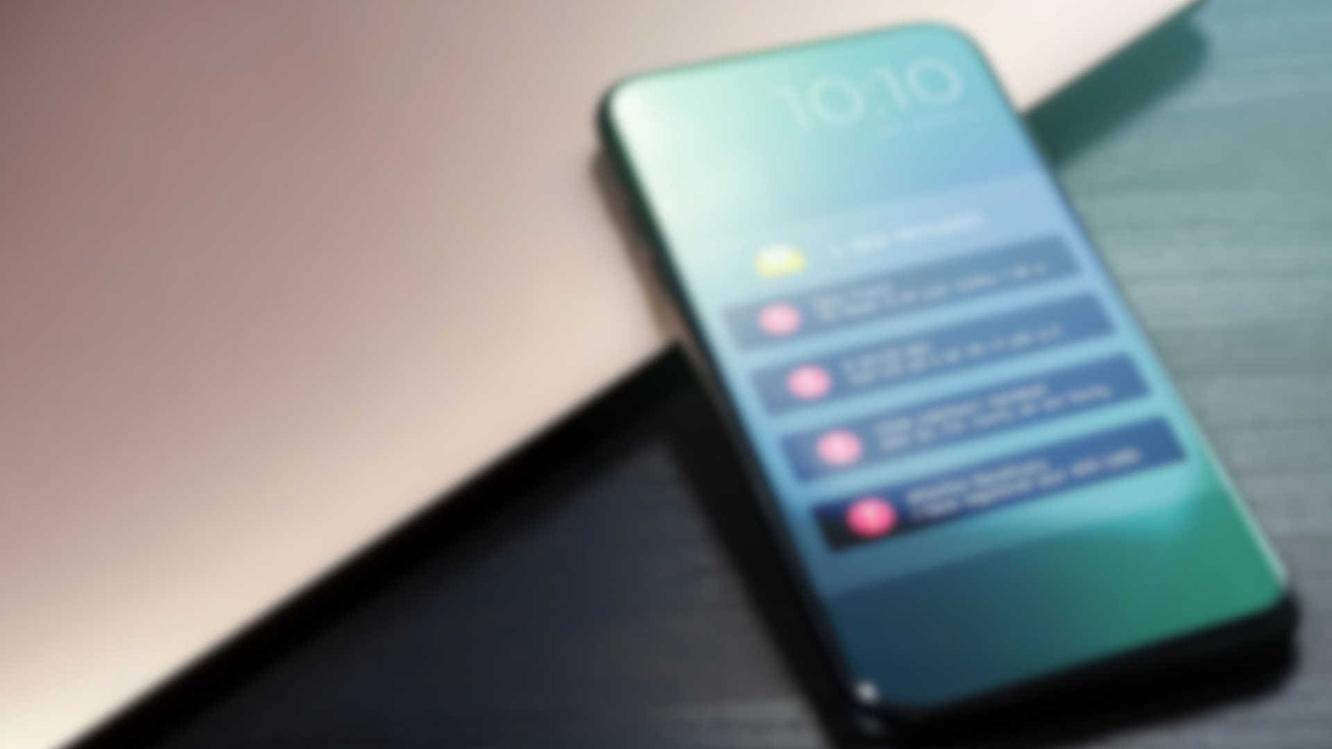 A blurred phone with a lot of notifications on the lock screen