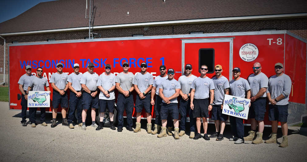 Wisconsin Task Force 1 swiftwater team members return to Wisconsin. Courtesy: Wisconsin Emergency Management