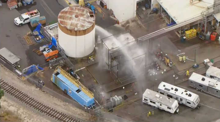 Hazmat teams cleaning up a chemical spill