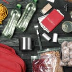 supplies for being prepared for disasters spread out on a table