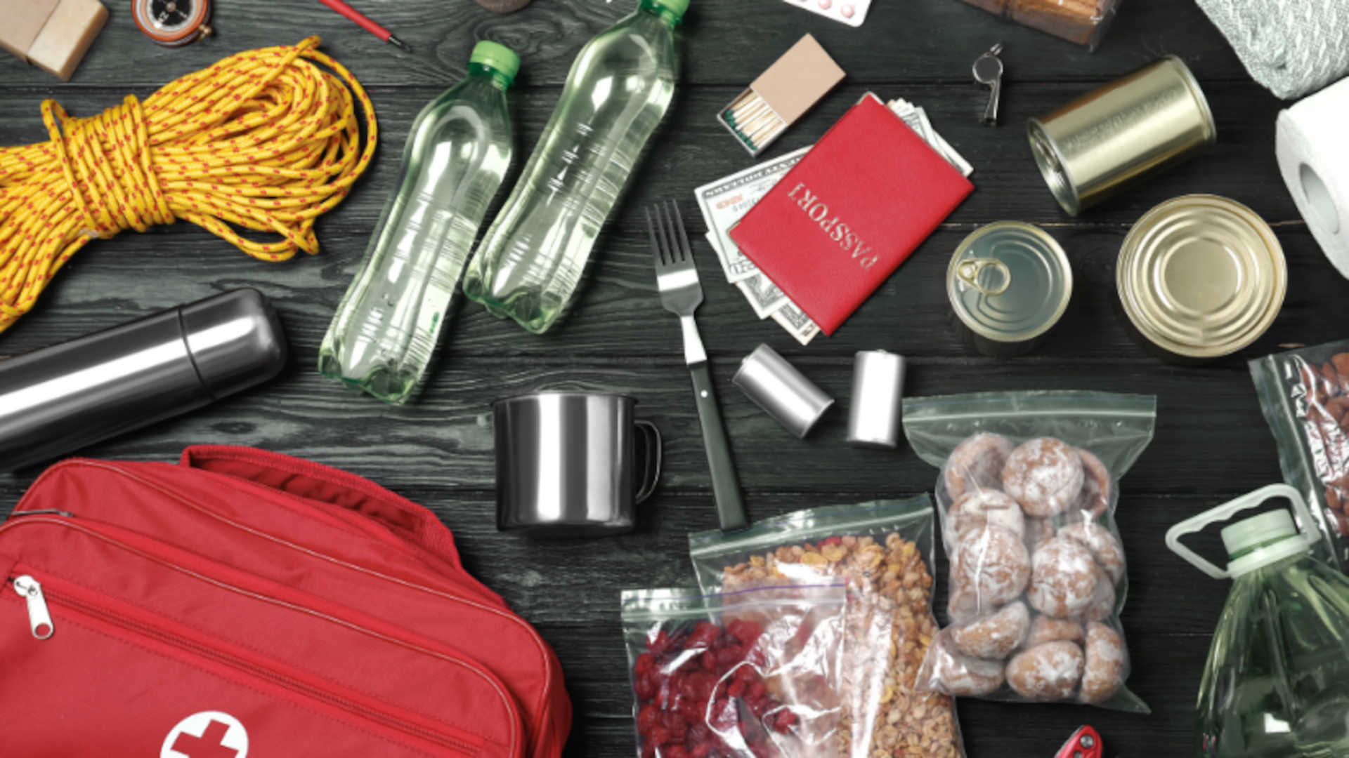 supplies for being prepared for disasters spread out on a table
