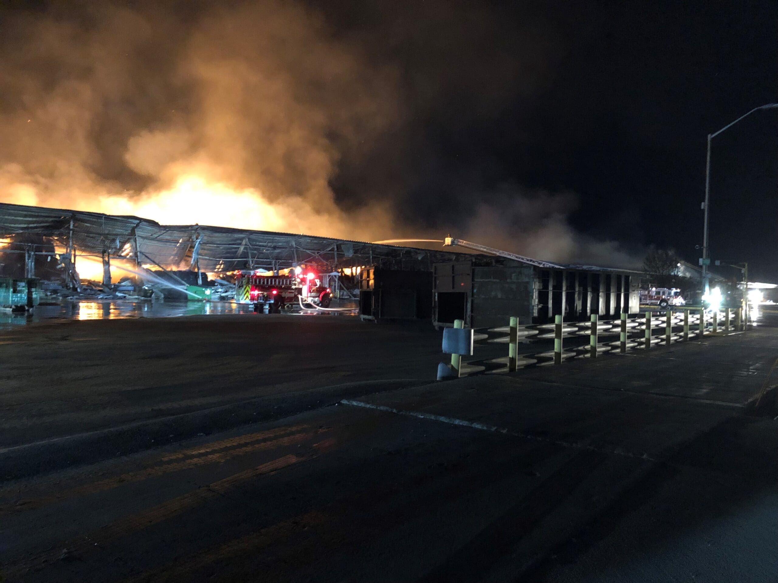 Large structure on fire at night