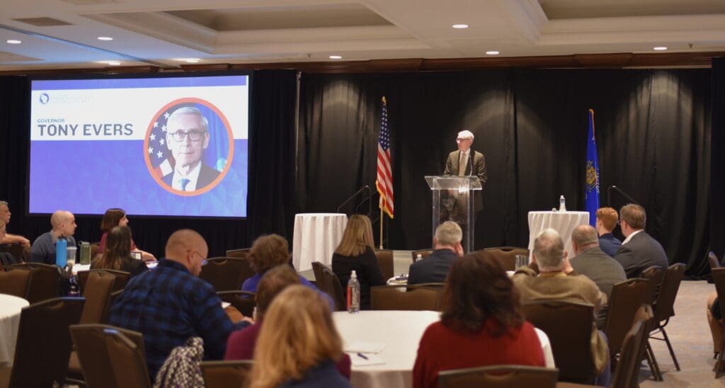 Governor Tony Evers addressing the conference