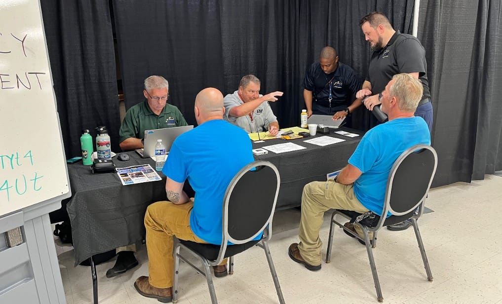 Racine County emergency management staff operate a booth during the MARC portion of the recovery exercise in Racine